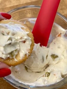 cracker with olive cheese spread