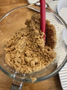 graham cracker crumbs and butter in a bowl