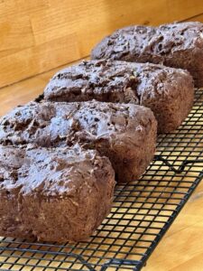 Chocolate zucchini Loaves on cooling rack