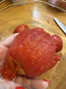 remove peelings and cores from tomatoes