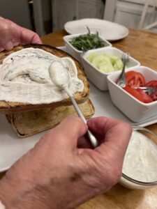 Adding mayo and condiments to grilled dill ahi tuna steaks