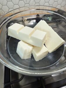 use a double boiler to melt the white chocolate for the pencil end of the pencil cookie.