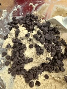 adding chocolate chips to s'mores dough