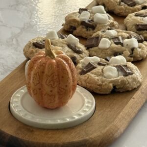 feature s'mores cookie on serving tray with pumpkin