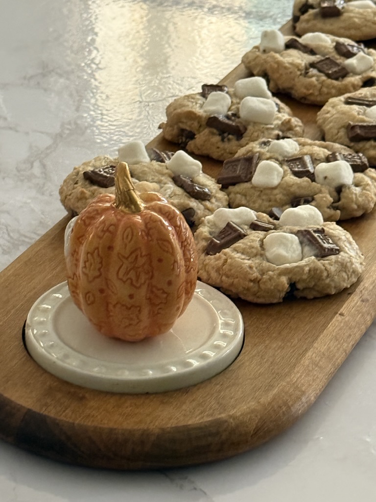 feature s'mores cookie on serving tray with pumpkin