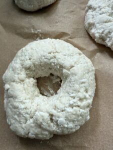 make hole in center of bagel dough