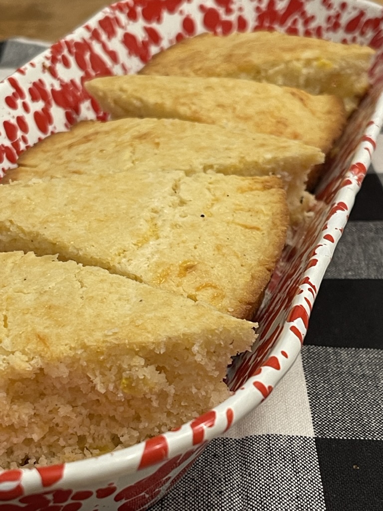 side view of red tray of cornbread wedges