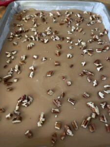 layer of toasted pecans on English toffee