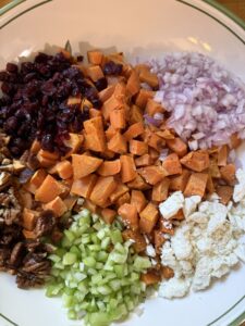 Mixing Sweet Potato salad ingredients