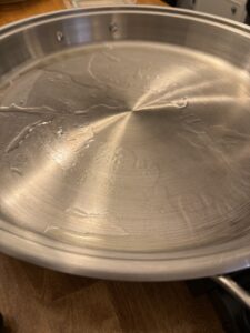 oil added to electric skillet to cook smashed chicken tacos