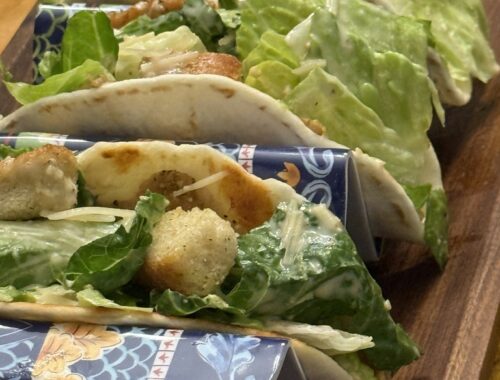 feature smashed chicken Caesar Salad Tacos