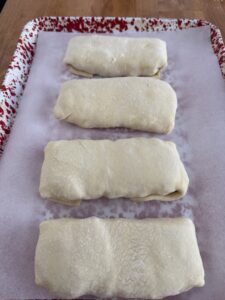 Salmon Wellingtons sealed and turned over