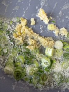 butter, garlic and green onions