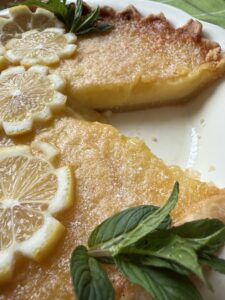 lemon buttermilk pie with slice removed