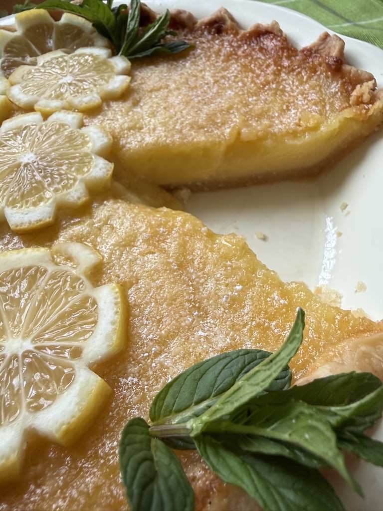 lemon buttermilk pie with slice removed