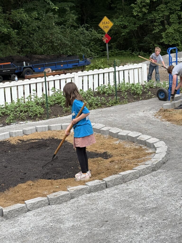 Fix kids working in the AI inspired garden