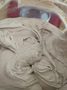 cocoa powder added to whipped whipping cream for Chocolate Peanut Butter ice cream