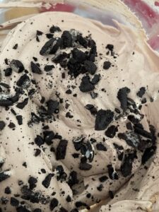 chopped oreo cookies add to chocolate ice cream