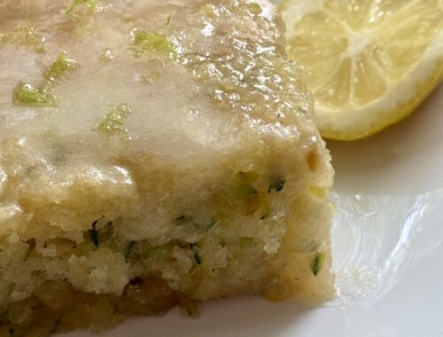 Glazed Lemon Zucchini cake on a plate