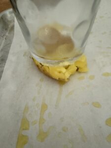use bottom of a glass to smash the boiled potatoes on a oil covered parchment lined baking sheet