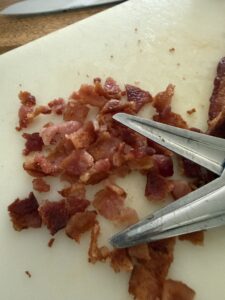 use kitchen shears to chop cooked bacon