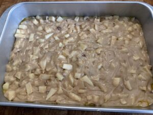 caramel apple cake batter added to pan