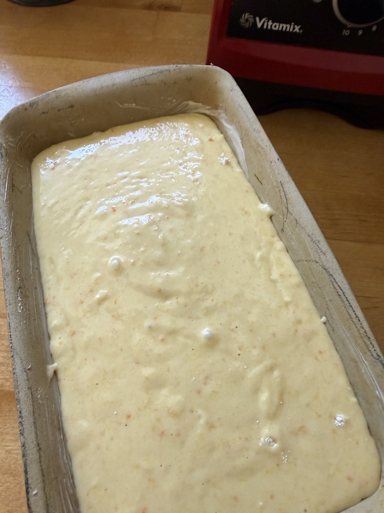 orange blender loaf pan batter added to greased loaf pan