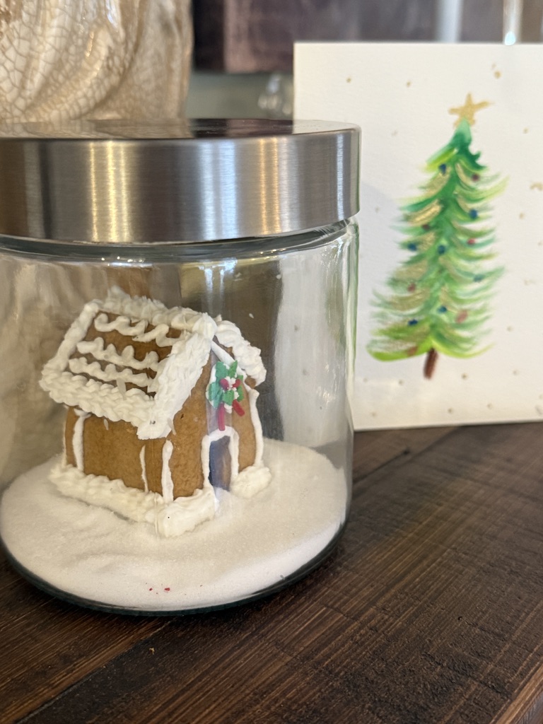 tiny gingerbread house in glass jar